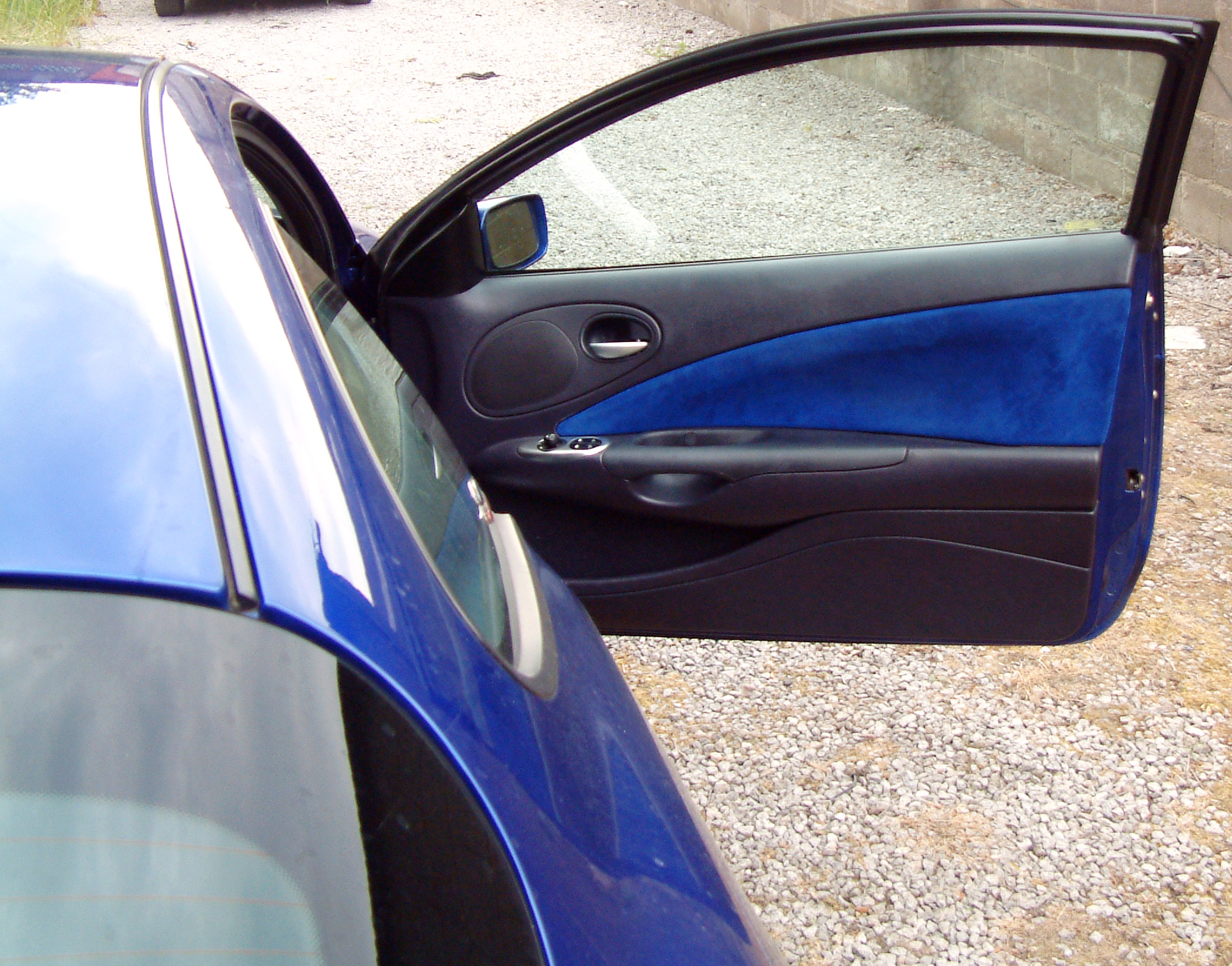 Blue+alacantra+and+leather+door+panel