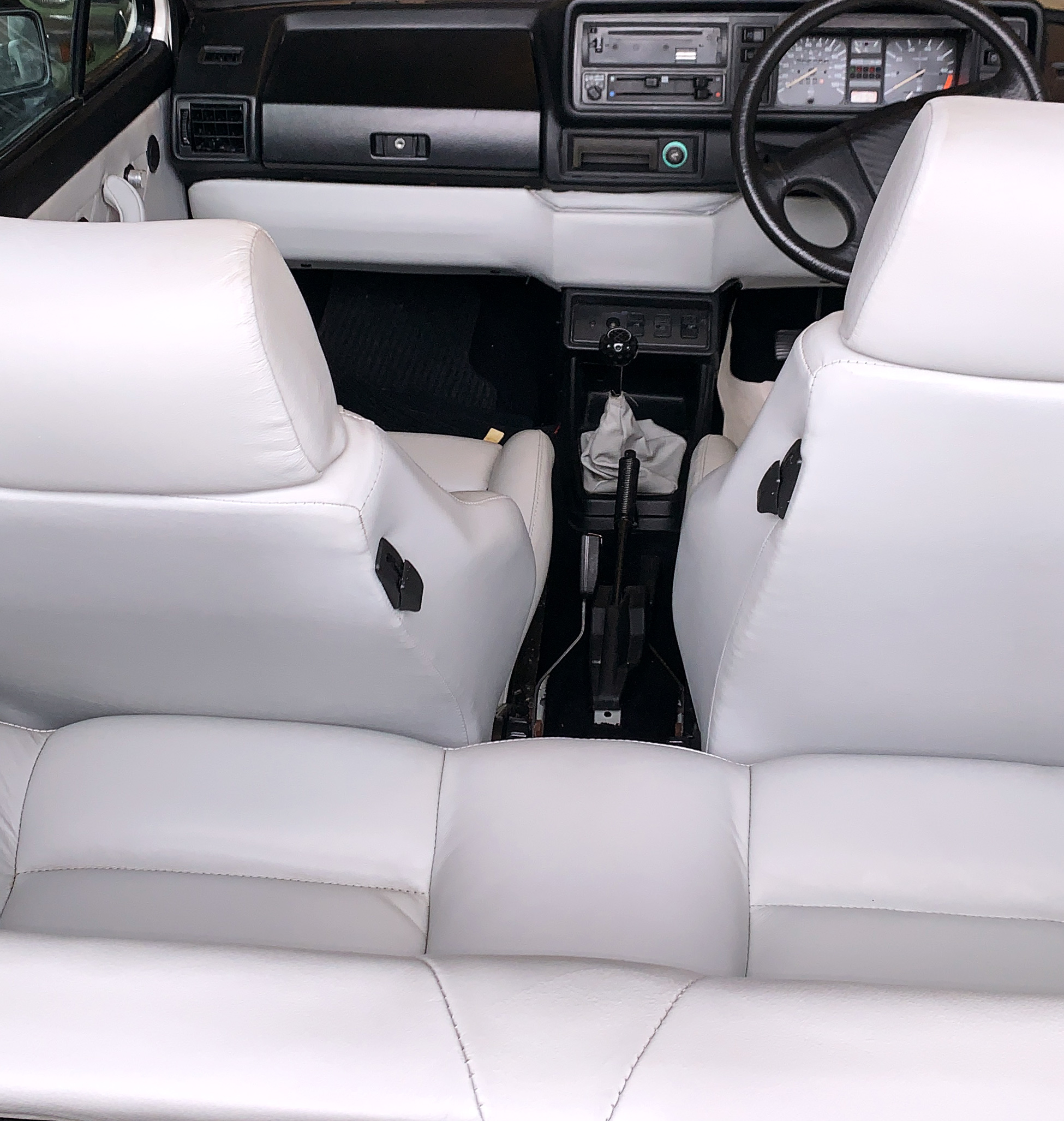 White+leather+car+upholstery%2C+door+panels+and+dash